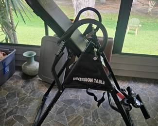 Did I mention that my client was a massage therapist? Here is a practically unused inversion table, except for the handrail foam that is cracked
