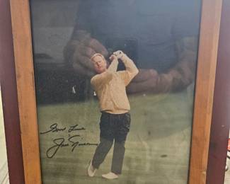 This is a personal favorite of mine from this estate. Jack Nicklaus autographed photo and framed looks pretty old with the amount of dust that was on it. $75