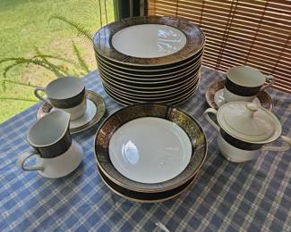 We have a 99 piece set of China beautiful pattern I'll describe in another photo. I only put this amount out so the rest is in the tote below all wrapped up so you don't have to do it