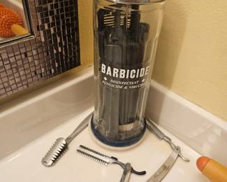 I like this ensemble vintage barber cleansing tower full of combs priced at $35, We also have the three vintage hair trimming pools that are also shown at $15 each. Bulk price for all $60