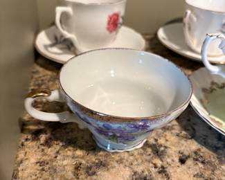 Vintage Porcelain Teacup and Saucer Set with Violets and Gold Trim