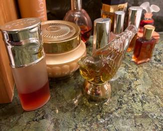 Assorted Designer Perfume Bottles including Gloria Vanderbilt, Chloé, and Lalique