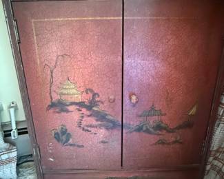 Asian inspired tall, narrow bookcase.