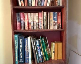 Asian inspired tall, narrow bookcase.
