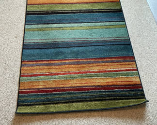 Lot 28: Multicolor Striped Area Rug