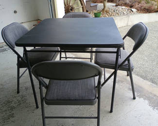 Lot 75: Folding table and chairs