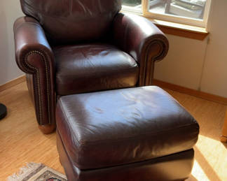 Lot 6: Leather Armchair And Ottoman