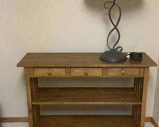 Lot 16: Wooden Console Table with Three Drawers, Shelves, and a Metal Table Lamp