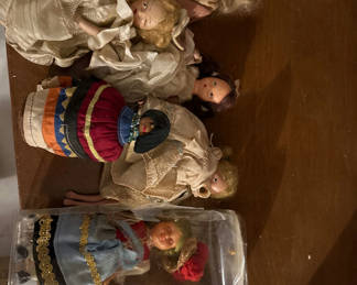 Lot 62: Collection of vintage dolls in elaborate dresses