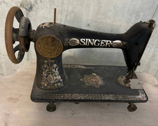 Lot 37: Antique Singer sewing machine with ornate decals