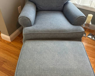 Lot 15: Blue upholstered armchair with matching ottoman