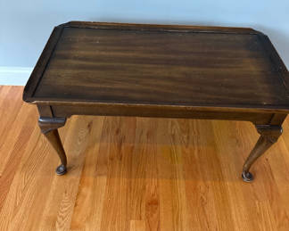 Lot 5: Dark wooden coffee table with cabriole legs