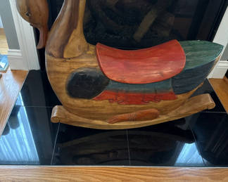 Lot 13: Wooden rocking horse with colorful carvings