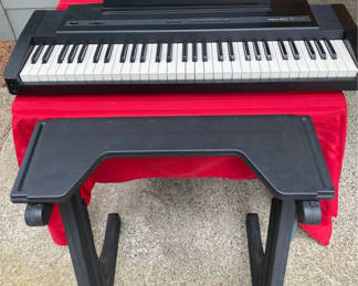 Lot 23: Digital Piano and Stand