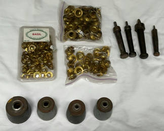 Lot 77: Assorted brass eyelets and metal tools