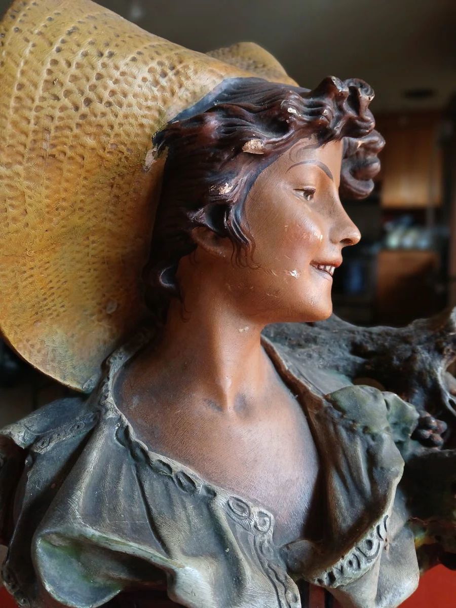 SCULPTURE OF VINEYARD WORKER