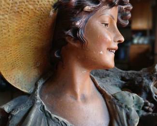 SCULPTURE OF VINEYARD WORKER