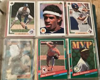 ALBUM OF BASEBALL CARDS, 1990s FLEER RICKEY HENDERSON, WILL CLARK, RYNE SANDBERG, ROGER CLEMMONS, WADE BOGGS,
