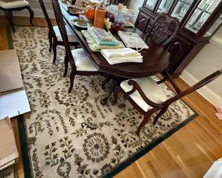 Large Rug, Dinning room Table and 8 chairs, 2 leaves, table top protector