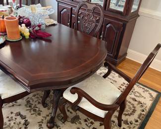 Dinning Room Table and Chairs, also has 2 leaves to extend and protective cover