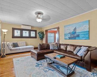 leather sectional, coffee table, area rug, chaise lounge