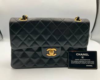 Authenticated Chanel Matelasse 23 flap bag crafted from lambskin leather with goldtone hardware