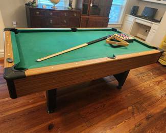 Pool table with equipment