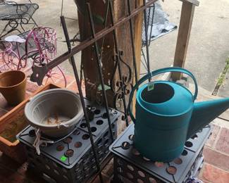 Garden gate and watering can