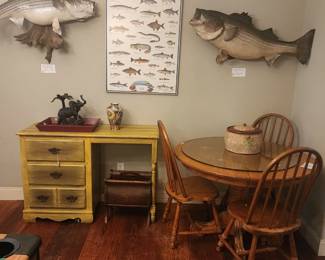 Large fish mounts, round table with 3 chairs