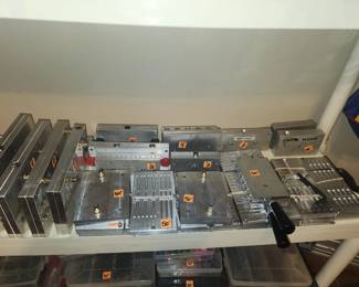 large collection of lure molds for lead and plastics