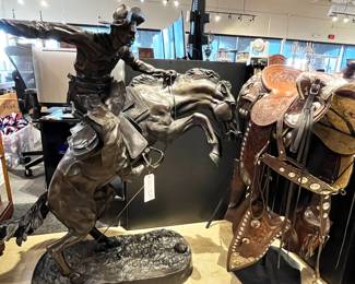 After Frederic Remington, "Bronco Buster", oversized bronze recast sculpture , height: 61 inches
