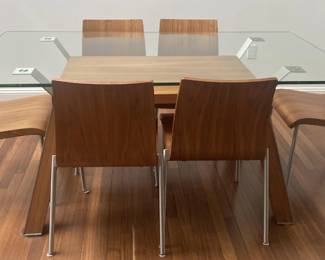 •	Glass, wood, and chrome dining table and 6 modern matching wooden and chrome chairs