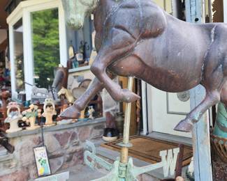 Weathervanes amd cast iron door stops