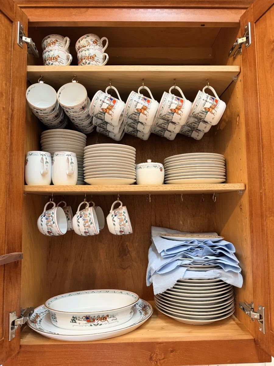 Village Christmas by Royal Worchester 12 place settings + some extra dinner plates, mugs, serving pieces, cream/sugar. Price $1000