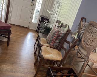 Numerous chairs, pillows, and furnishings