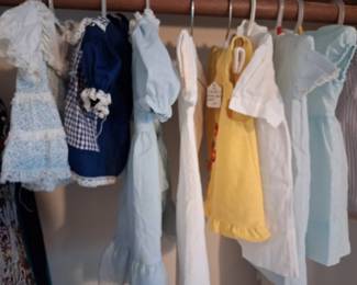 SOME OF THE MANY BABY AND DOLL DRESSES