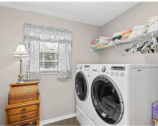 Front loader, washing machine and dryer