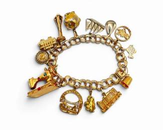 146 14KGoldCharmBraceletwTravelNoveltyCharms54g