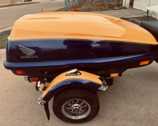 Nice motorcycle trailer. Honda decals