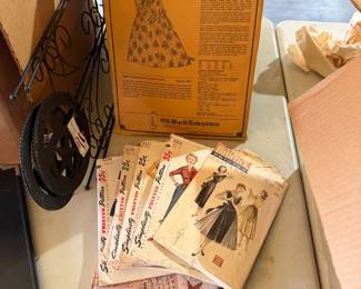Lot's of vintage material and sewing pieces