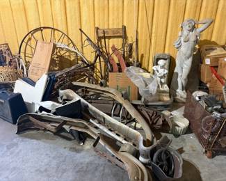 Car parts and vintage farm tools