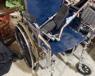 WHEEL CHAIR WITH LEG EXTENSIONS