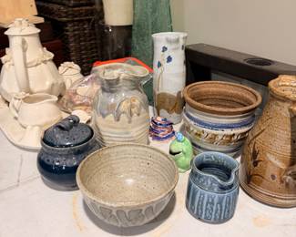 Assorted pottery vases bowls and home decor