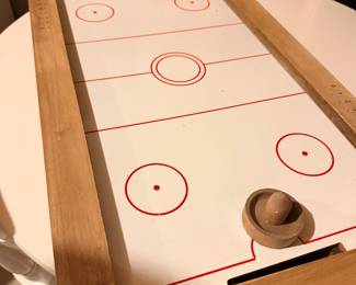 Tabletop air hockey game