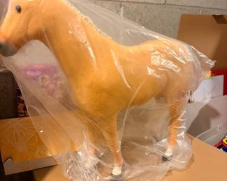 Collectible toy horse figure in packaging