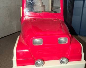 Red plastic toy car