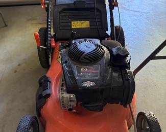 Orange gas lawn mower