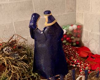 Holiday decorations and blue ceramic bottles
