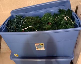 Tote of Christmas garland lights and decor