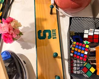 Game table with Rubik's cubes and puzzles